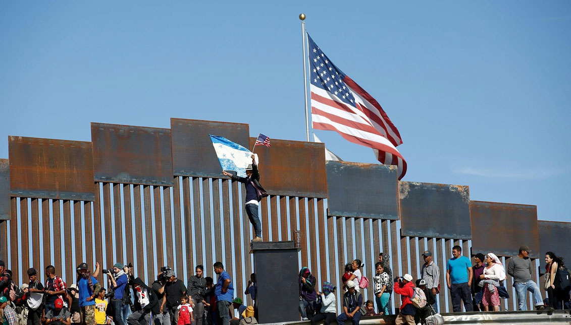 Immigrants on the US-Mexico border / REUTERS