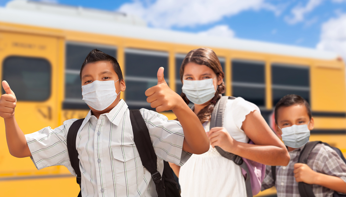 Children return to school with health protocols. Photo: Depositphotos