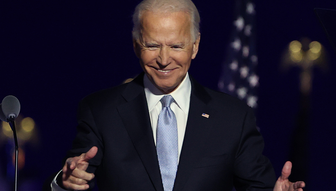 President-elect Joe Biden gestures toward crowd at the Chase Center November 07, 2020 in Wilmington, Delaware.  (Photo by Tasos Katopodis/Getty Images)