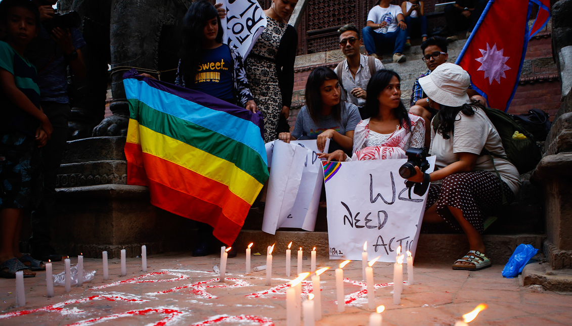 Mourners are seen grieving for their loved ones who were victims of the mass shooting in June 2016. Photo: Getty Images.
