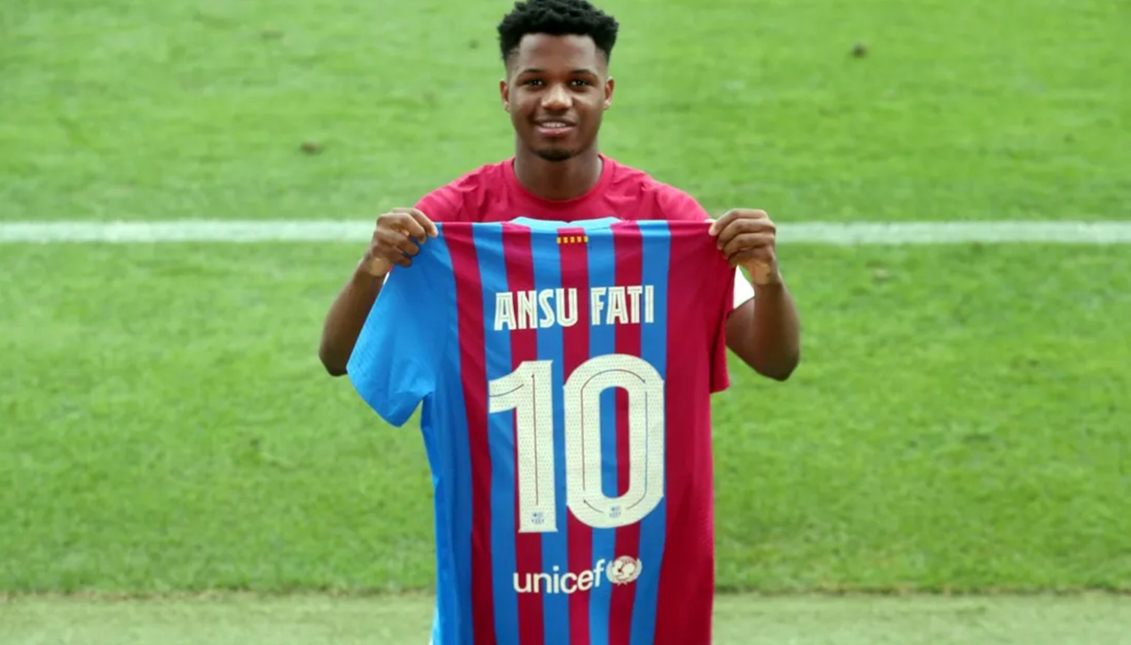 Ansu Fati holding his new number 10 shirt for FC Barcelona. Photo: fcbarcelona.com