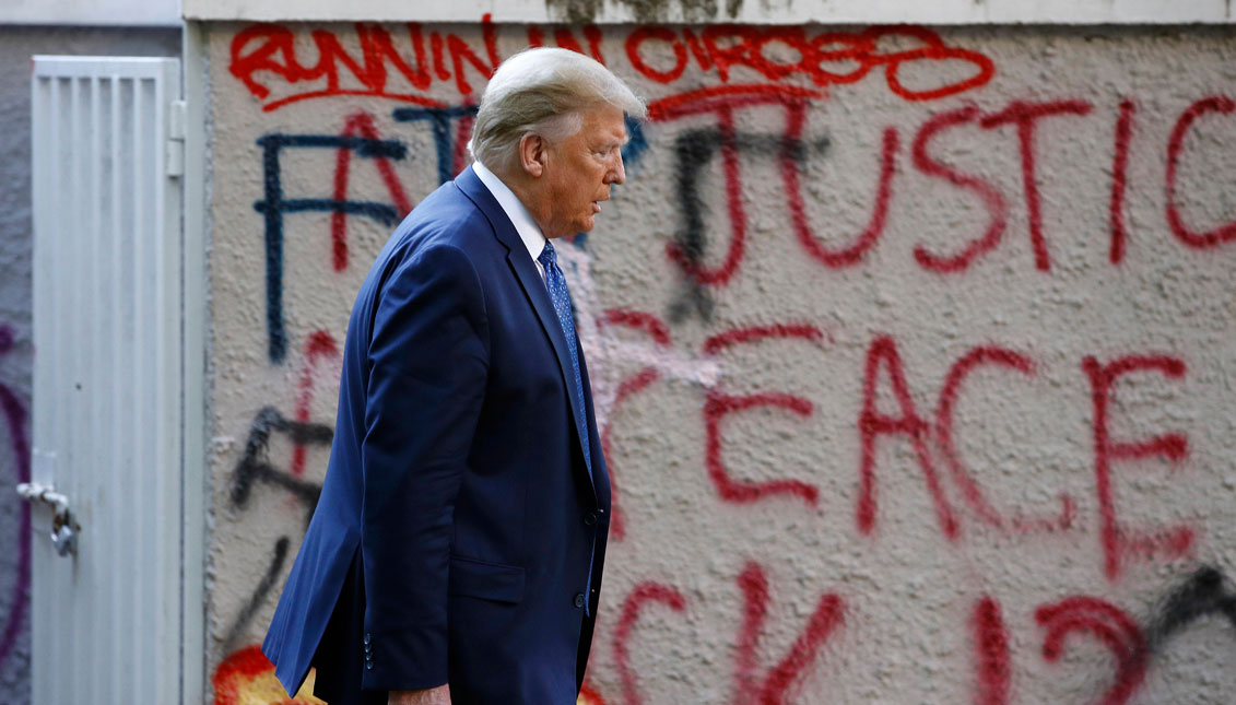 President Donald Trump walks from the White House through Lafayette Park to visit St. John's Church after the Washington protests.