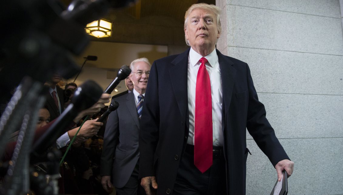 US President Donald J. Trump (C) and Human Services secretary Tom Price (L) walk to a meeting with House Republicans to encourage a deal on the American Health Care Act in the US Capitol in Washington, DC, USA, 21 March 2017. EPA/SHAWN THEW
