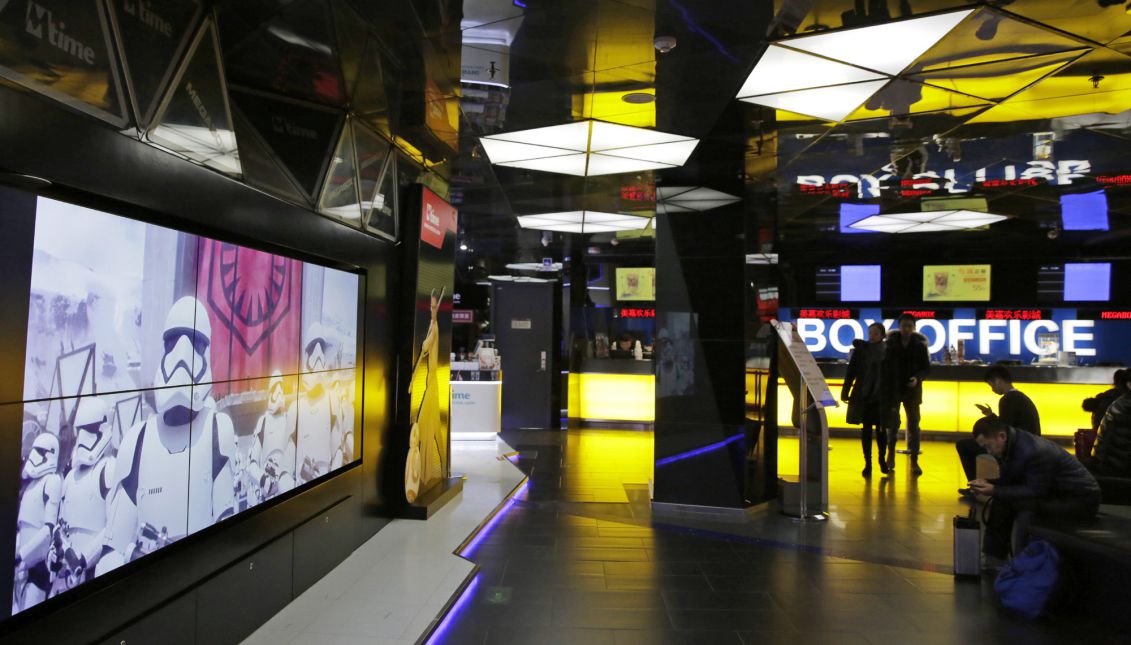 A trailer of 'Star Wars: The Force Awakens' is shown inside the ticket office of a cinema in Beijing, China, 08 January 2016. EPA/HOW HWEE YOUNG
