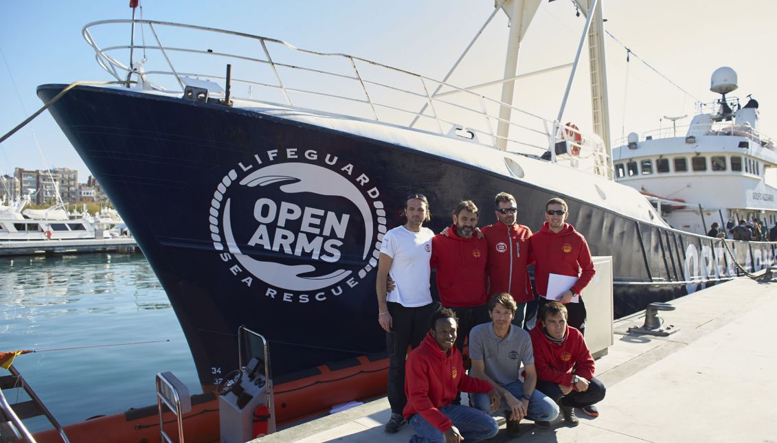  Director of the non-governmental organization Proactiva Open Arms, Oscar Camps, poses with crew members during the presentation of the new ship 'Golfo Azurro' in Barcelona, northeastern Spain, 23 December 2016. EPA/ALEJANDRO GARCIA
