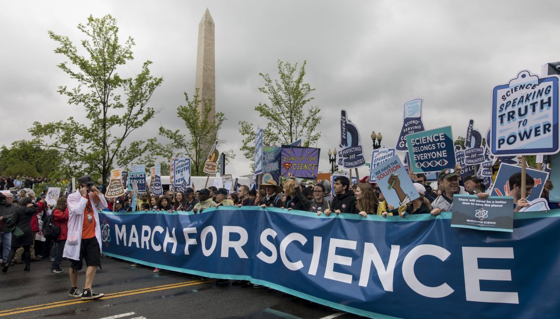 Tens of thousands of protestors walk along Constitution Avenue during the March for Science in Washington, DC, USA, 22 April 2017. EPA/JIM LO SCALZO
