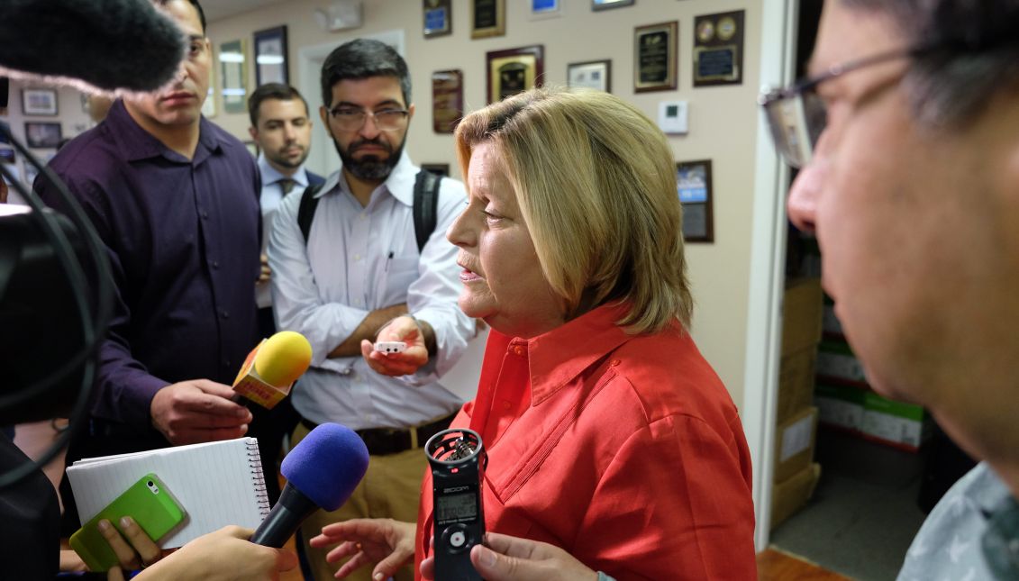 Republican Congresswoman Ileana Ros-Lehtinen (c) of Florida speaks with reporters after a press conference on Aug. 12, 2015, in Miami. Ros-Lehtinen announced on April 30, 2017, that she would not seek reelection in the 2018 election and would leave Congress to "spend more time with her family." EFE/Gaston de Cardenas
