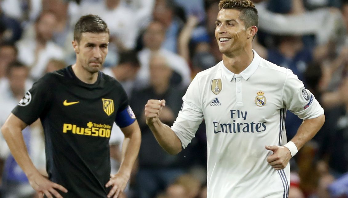 Real Madrid's Portuguese striker Cristiano Ronaldo (R) celebrates scoring the 3-0 during the UEFA Champions League semifinal match between Real Madrid and Atletico de Madrid at the Santiago Bernabeu stadium in Madrid, Spain, 02 May 2017. EPA/CHEMA MOYA