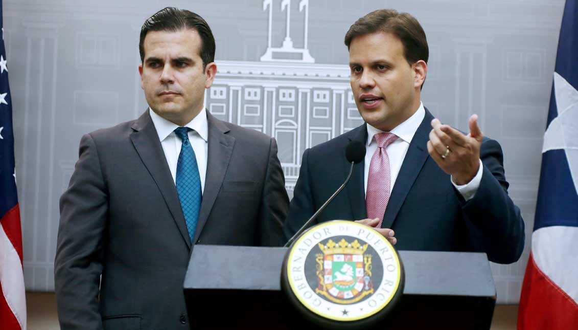 Puerto Rico Gov. Ricardo Rossello Nevares (L), next to representative to the Fiscal Oversight Boar (JSF), Elias Sanchez (R), during a press conference at La Fortaleza Governor residence. Puerto Rico on Wednesday sought relief under a law enacted to help the United States commonwealth restructure its massive debt load, paving the way for what could be the largest-ever bankruptcy case involving a US local government entity.. EFE
