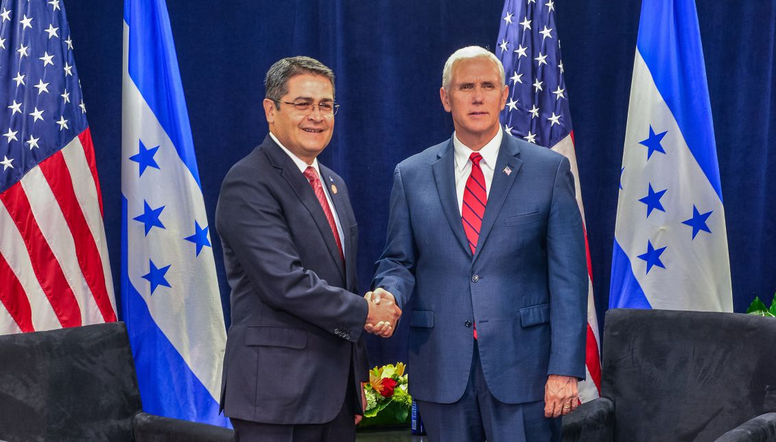 US Vice President Mike Pence shakes hands with Honduran President Juan Orlando Hernandez (L) during the opening of the Conference on Prosperity and Security in Central America in Miami, Florida, United States, 15 June 2017. EFE/Giorgio Viera
