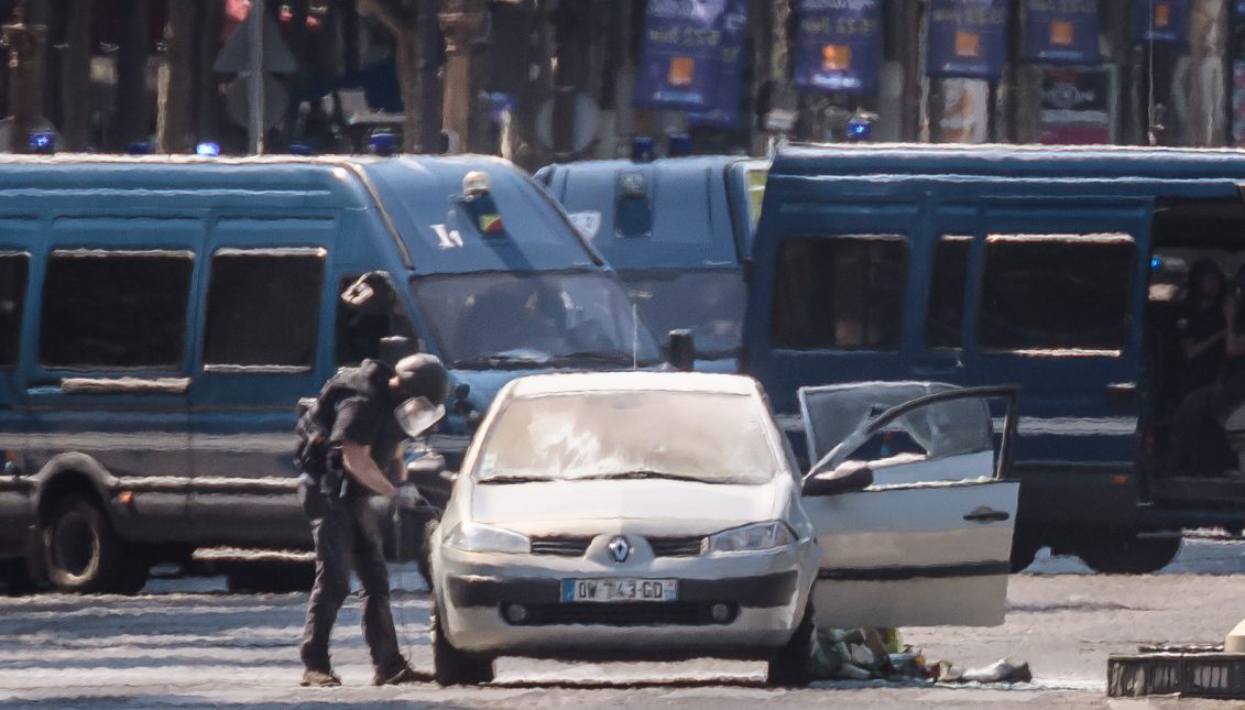 A file picture showing a police operation under way on the Champs Elysees after a car collided with a police vehicle in Paris, France, June 19, 2017. EPA/CHRISTOPHE PETIT TESSON
