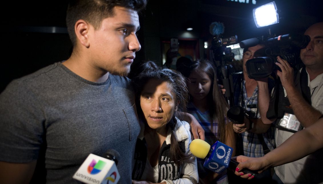 Photo provided on June 20, 2017 showing Mexican Rosenda Perez (C) next to her older son Francisco Duarte Jr., after being freed just a sort distance from the international border crossing with Mexico in San Ysidro, San Diego, California, United States on June 19, 2017. EFE/David Maung