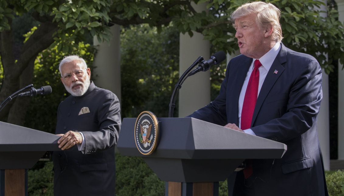 US President Donald J. Trump (R), with Indian Prime Minister Narendra Modi (L), delivers remarks during a ceremony in the Rose Garden of the White House in Washington, DC, USA, 26 June 2017. EPA/SHAWN THEW
