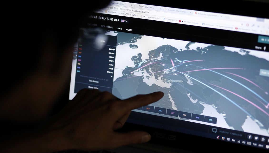 An engineer checks live cyber threat maps and statistics at his office in Istanbul, Turkey, 27 June 2017. EPA/ERDEM SAHIN
