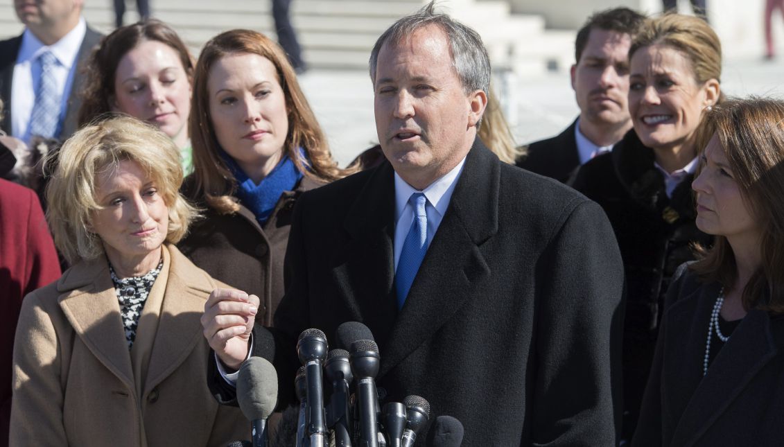 Texas Attorney General Ken Paxton (C) delivering remarks to the news media, at the Supreme Court on Capitol Hill in Washington, DC, USA, Mar. 2, 2016. EFE/Shawn Thew