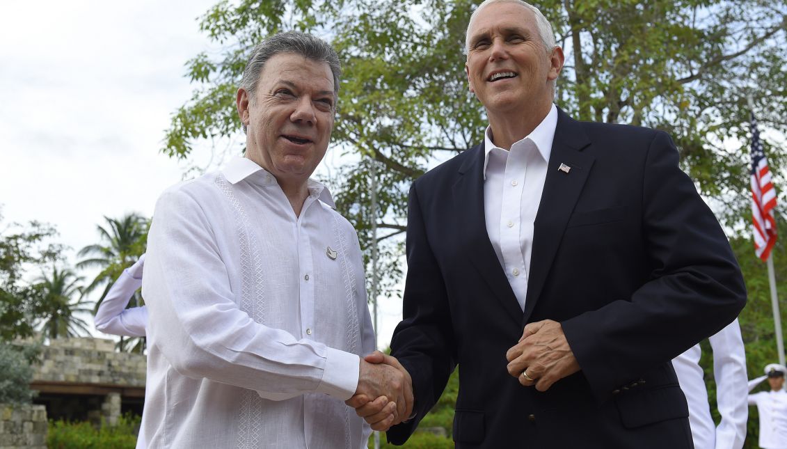 Colombian President Juan Manuel Santos (L) shaking hands with US Vice President Mike Pence at the Guests House in Cartagena, Bolivar, Colombia, 13 August 2017. Pence arrived in Cartagena as the first stop of his Latin American tour. EPA/Cesar Carrion/COLOMBIAN PRESIDENCY