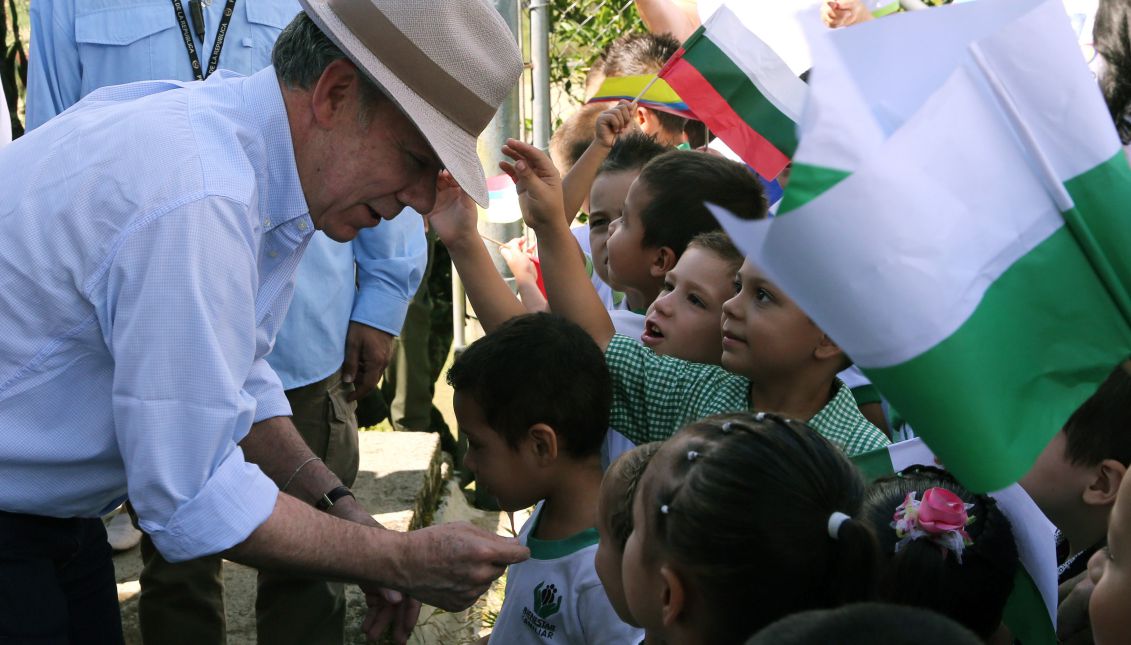 President Juan Manuel Santos greets children in Cocorna, Colombia, on Aug. 17, 2017. Santos expressed his hope to have removed anti-personnel mines from half the 20 square miles of territory contaminated with them by the end of his term in office in August 2018 and to make Colombia free of landmines by 2021. EFE/Mauricio Duenas Castaneda