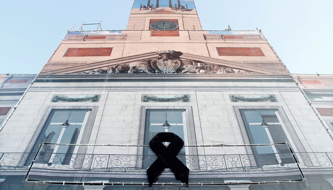 Exterior view of Madrid's regional seat of government with a symbol of mourning for the Barcelona terror attack, in Madrid, Spain, on Aug. 17, 2017. EFE/Diego Sinov