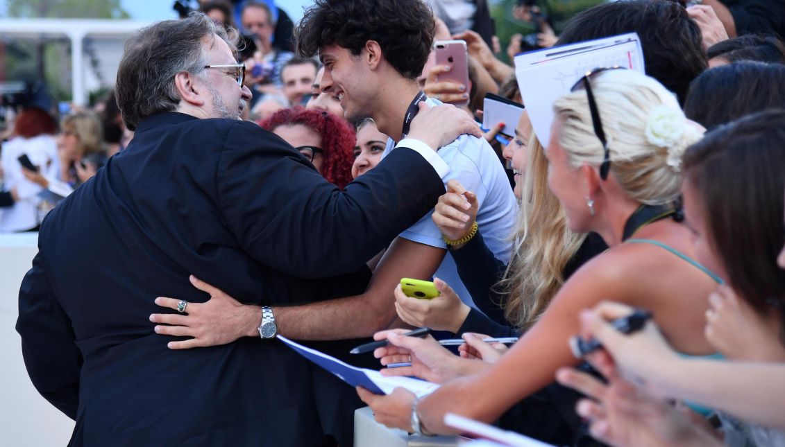 Mexican director Guillermo Del Toro (L) signs autographs on the red carpet at the 74th annual Venice International Film Festival, in Venice, Italy, Sept. 09, 2017. EPA-EFE/FILE/ETTORE FERRARI