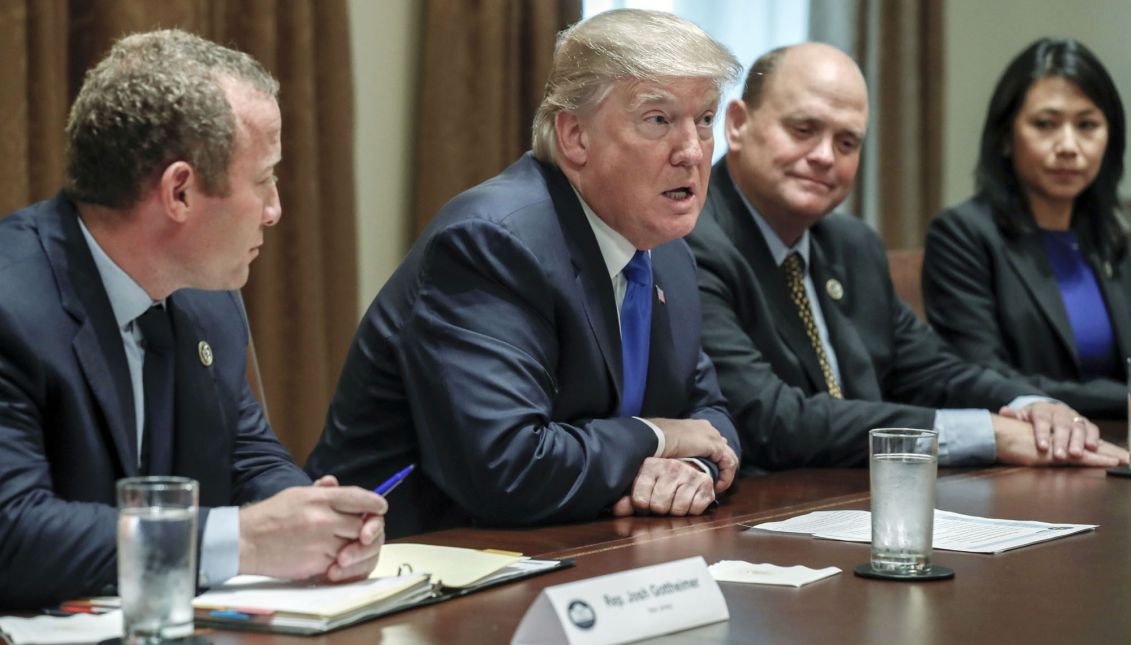 US President Donald J. Trump (2-L) with Democratic Representative from New Jersey Josh Gottheimer (L), Republican Representative from New York Tom Reed (2-R) and Democratic Representative from Florida Stephanie Murphy (R) delivers remarks during a bipartisan meeting of US representatives on tax reform in the Cabinet Room of the White House in Washington, DC, USA, 13 September 2017. EPA-EFE/SHAWN THEW