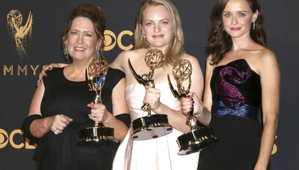 (L-R) Ann Dowd, Elisabeth Moss and Alexis Bledel, winners of the award for Outstanding Drama Series for 'The Handmaid's Tale,' pose in the press room during the 69th annual Primetime Emmy Awards ceremony held at the Microsoft Theater in Los Angeles, California, USA, 17 September 2017. EPA-EFE/NINA PROMMER