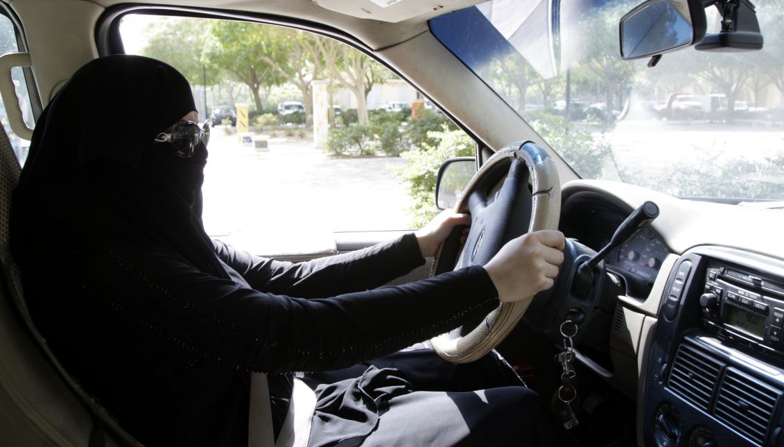 A Saudi woman sits behind the wheel of a car in Riyadh, Saudi Arabia, Oct. 28, 2013. EPA-EFE FILE/STR
