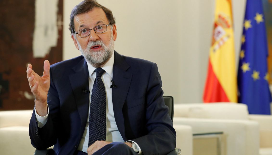 Spanish Prime Minister Mariano Rajoy gestures while speaking during an interview with Spanish News Agency EFE, at the La Moncloa Palace in Madrid, Spain, Oct. 5, 2017. EPA-EFE/ANGEL DIAZ