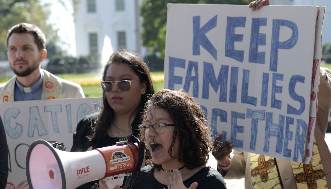 Students benefiting from the Deferred Action for Childhood Arrivals (DACA) hold signs in favor of the Dream Act during a protest called by the group United We Dream at Lafayette Park in front of the White House in Washington, Columbia, United States, Nov. 2, 2017. EPA-EFE/Lenin Nolly
