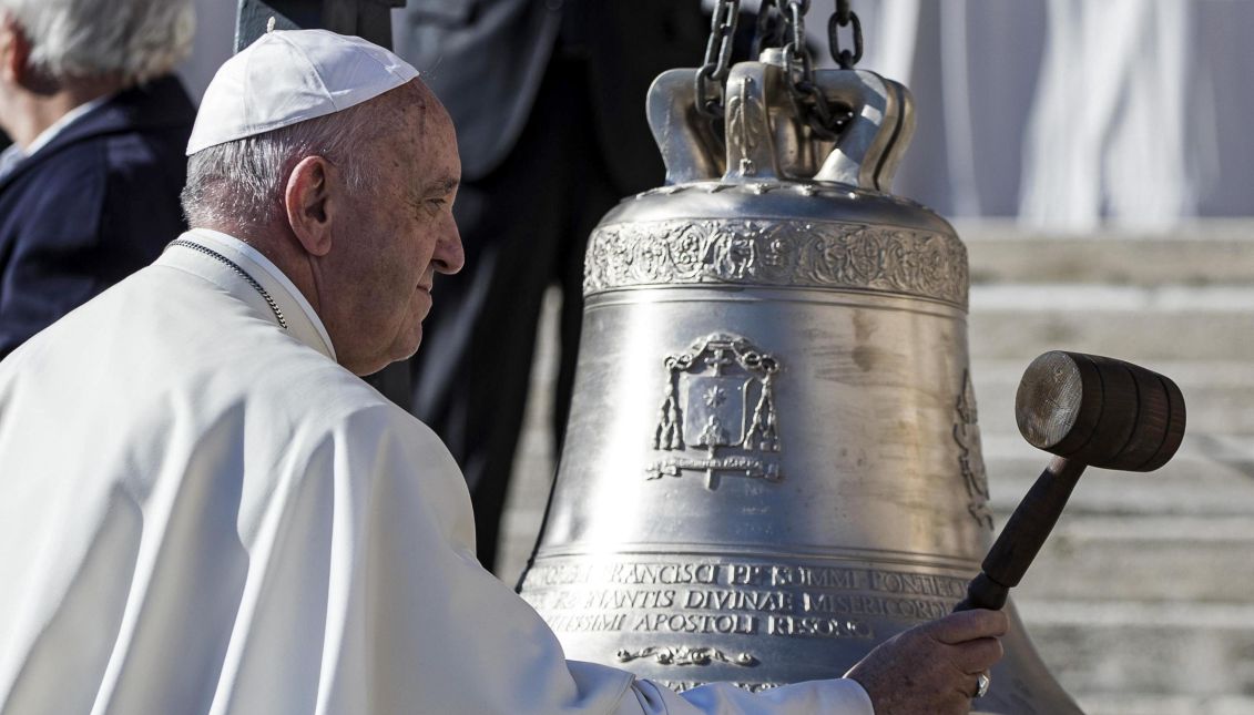 Pope Francis rings a bell that was donated to him during the general audience in S. Peter Square in Vatican City, Nov. 8, 2017. EPA-EFE/ANGELO CARCONI