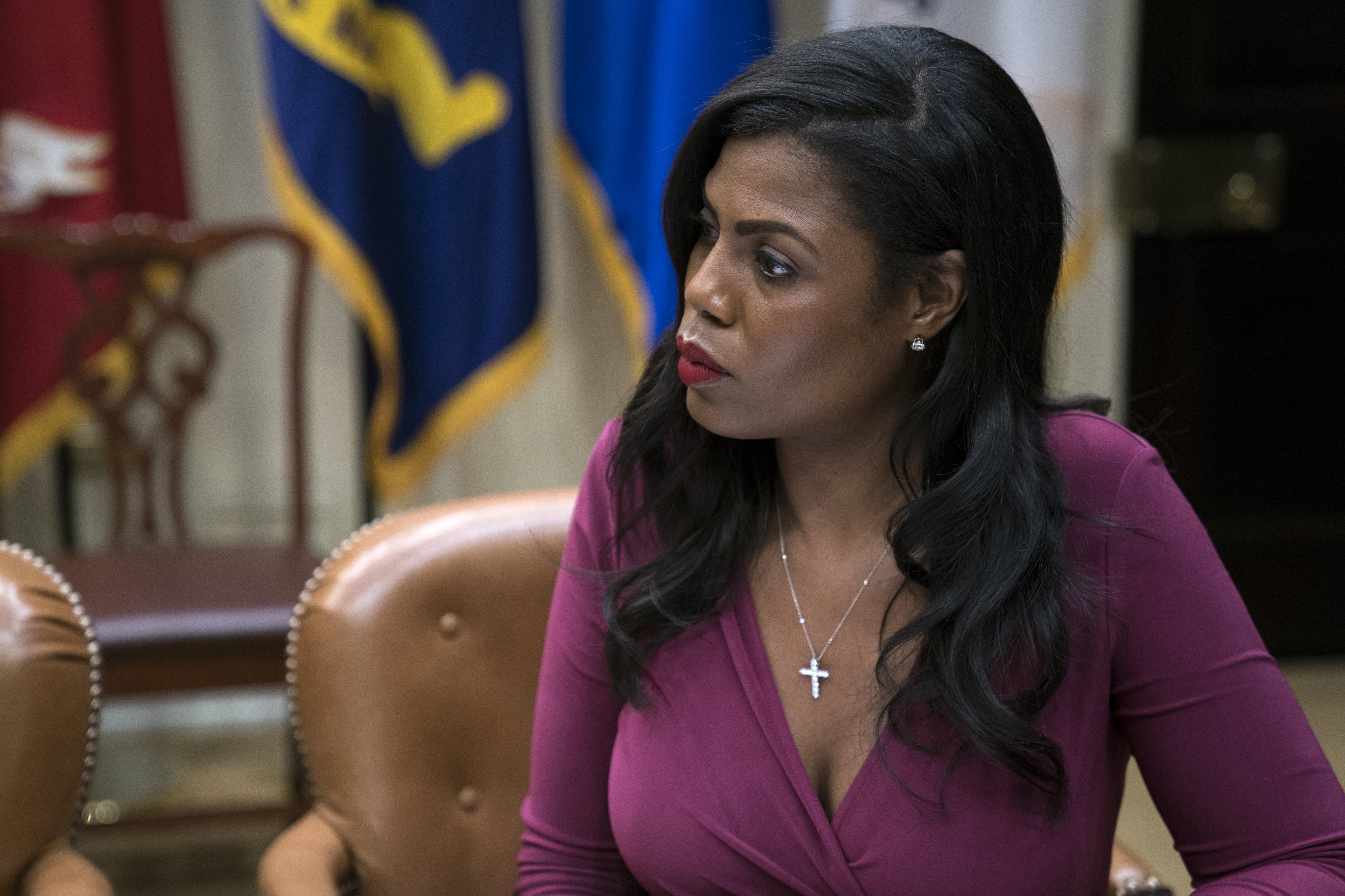 Trump's top African-American adviser resigns. White House director of communications for the Office of Public Liaison, Omarosa Manigault Newman, listens to remarks by Health and Human Services Secretary Tom Price during a health care listening session in the Roosevelt Room of the White House in Washington, DC, USA, June 21, 2017.