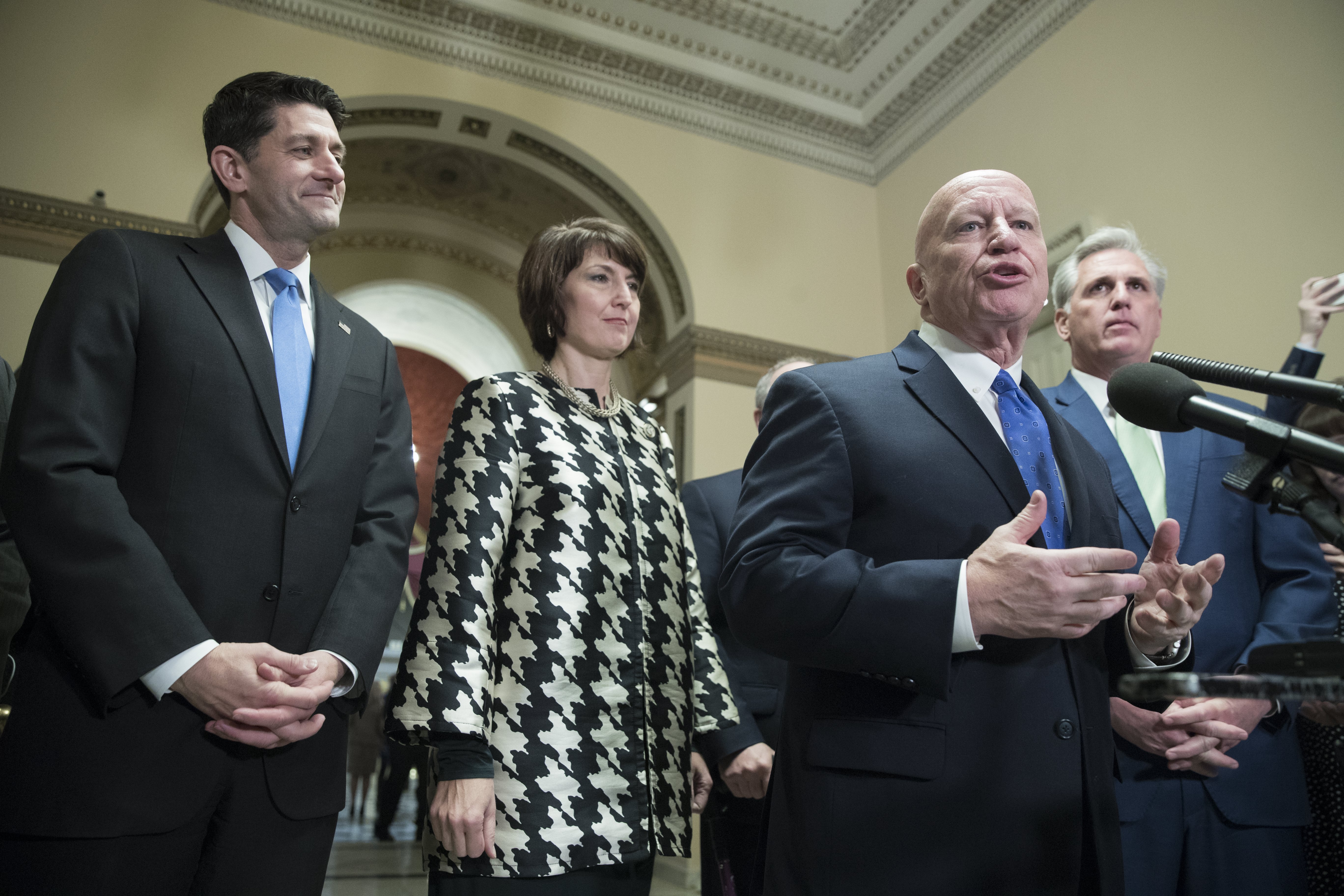 Speaker of the House Republican Paul Ryan (L) listens to Republican Representative from Texas and Chairman of the House Ways and Means Committee Kevin Brady (2-R) speak during a news conference, beside Republican Representative from Washington Cathy McMorris Rodgers (2-L) and House Majority Leader Republican Kevin McCarthy (R); after the House passed Republican-crafted tax legislation on Capitol Hill in Washington, DC, USA, Dec. 19, 2017.