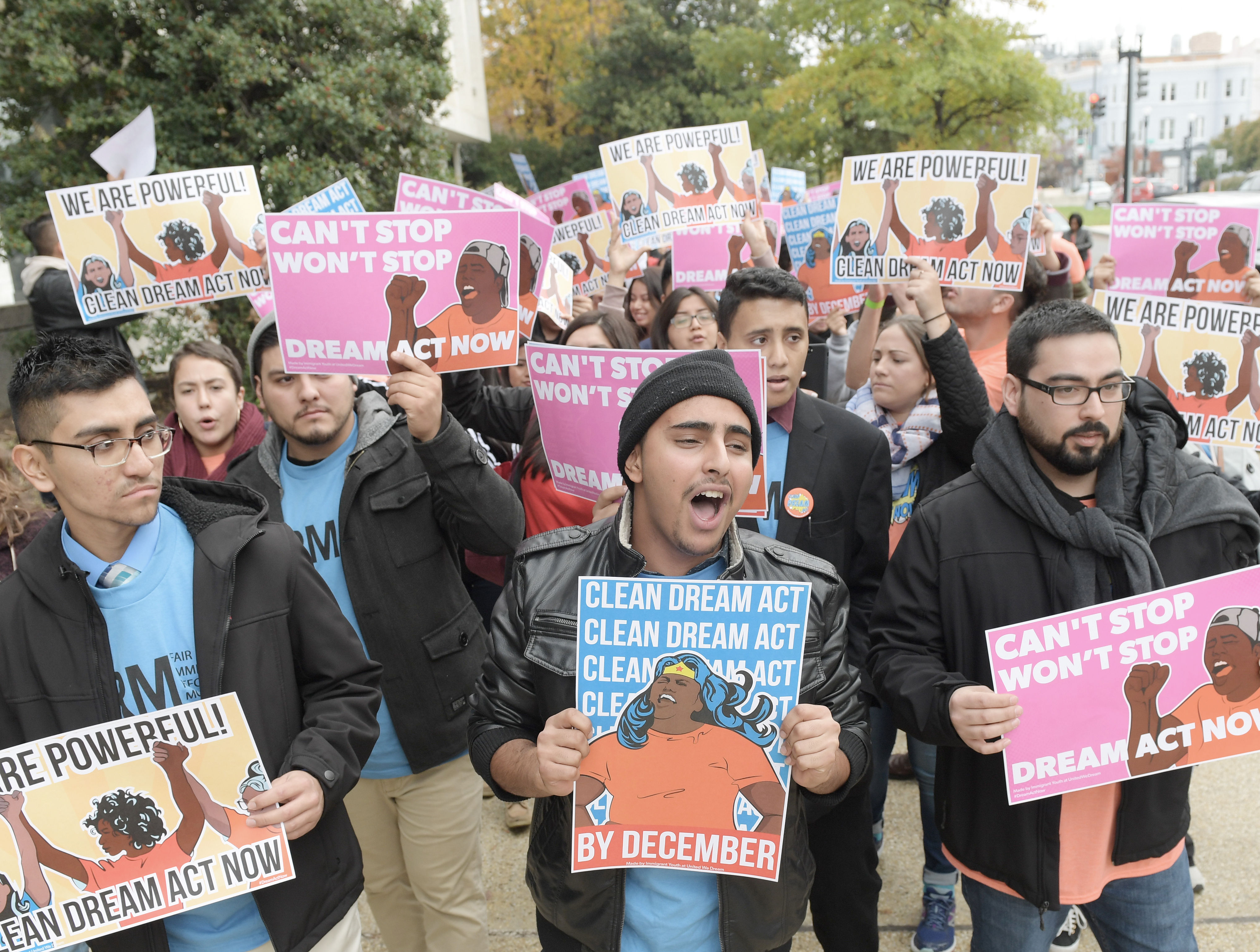 Deferred Action for Childhood Arrivals (DACA) recipients hold a march in Washingon on Nov. 9 to demand that Congress pass legislation to regularize their immigration status.
