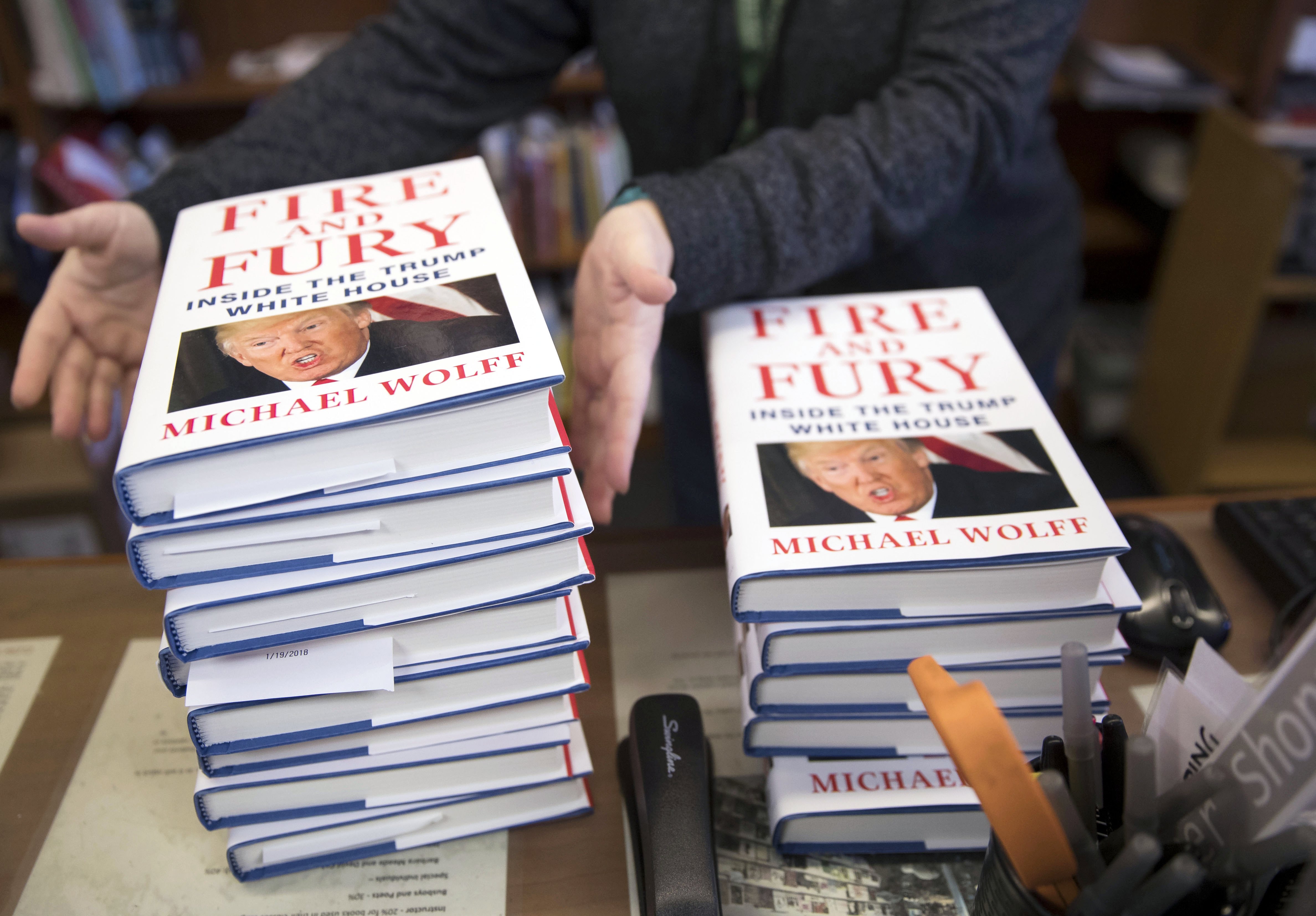 Presold copies of Michael Wolff's book "Fire and Fury: Inside the Trump White House," are stacked at Politics and Prose book store in in Washington, DC, USA, Jan. 5, 2018.