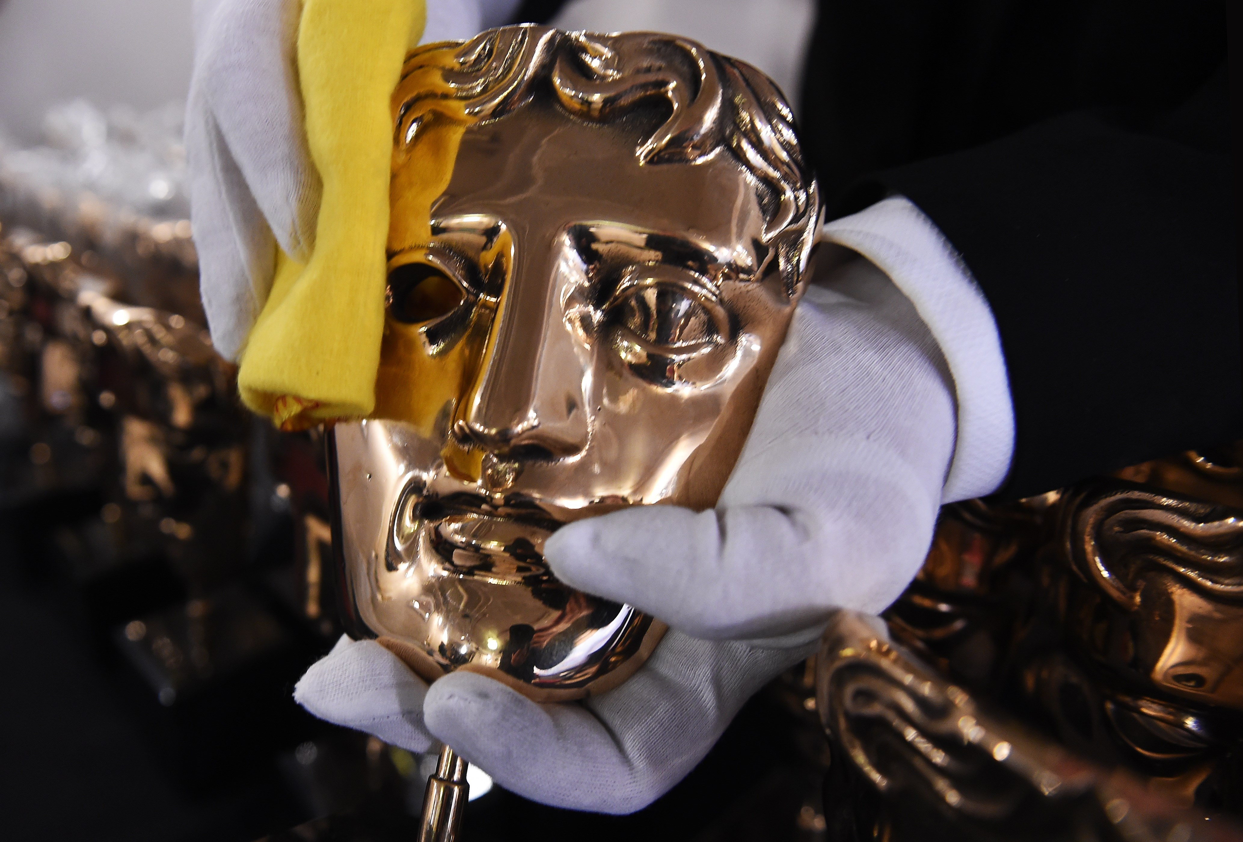 A BAFTA mask award is being polished before the 2017 EE British Academy Film Awards take place at the Royal Albert Hall in London, Britain, Feb. 12, 2017.