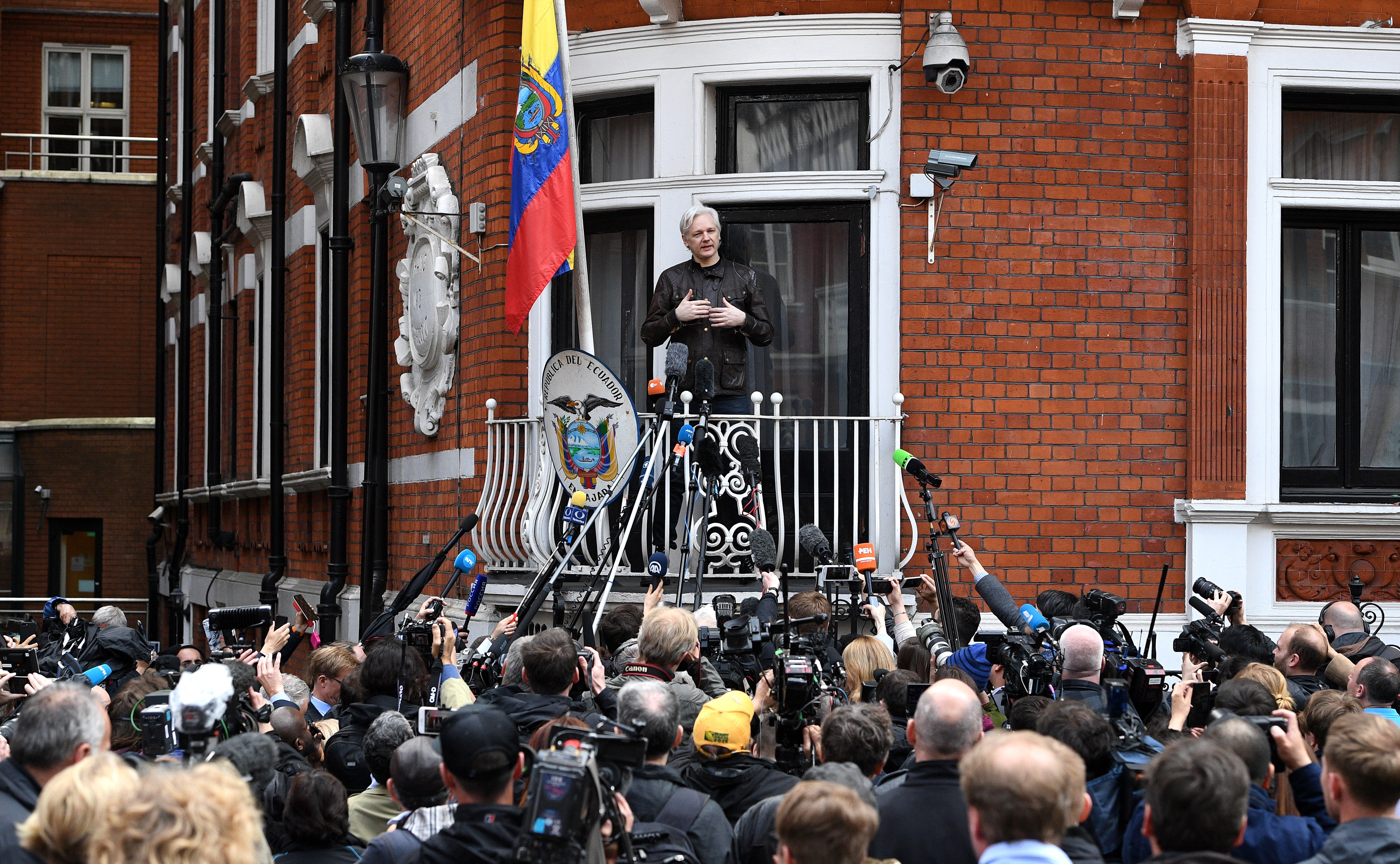 Australian activist Julian Assange speaks to the media from the balcony of the Ecuadorian Embassy in London, Britain, May 19, 2017.
