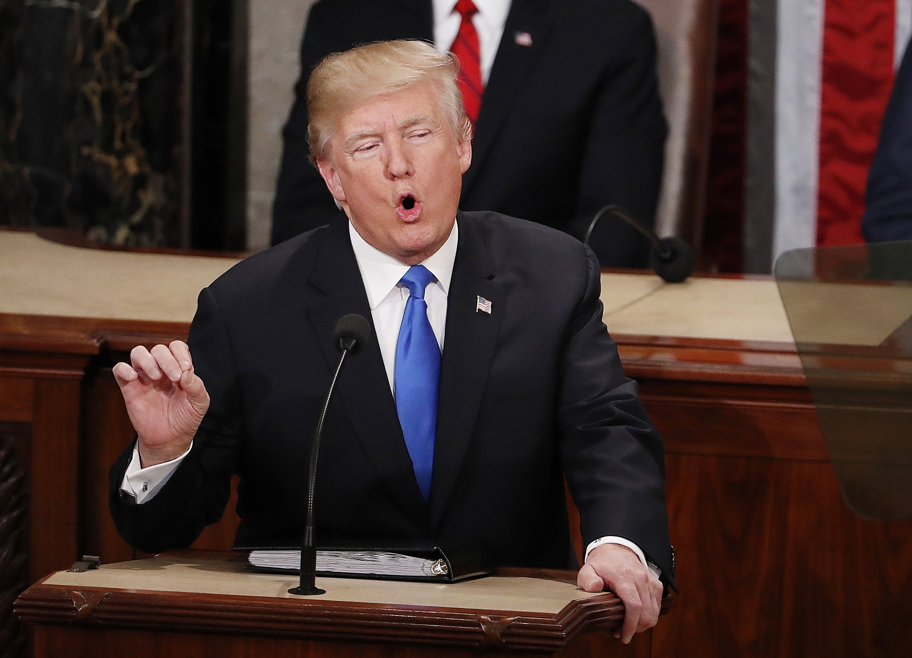 US President Donald J. Trump delivers his first State of the Union from the floor of the House of Representatives in Washington, DC, USA, Jan. 30, 2018.
