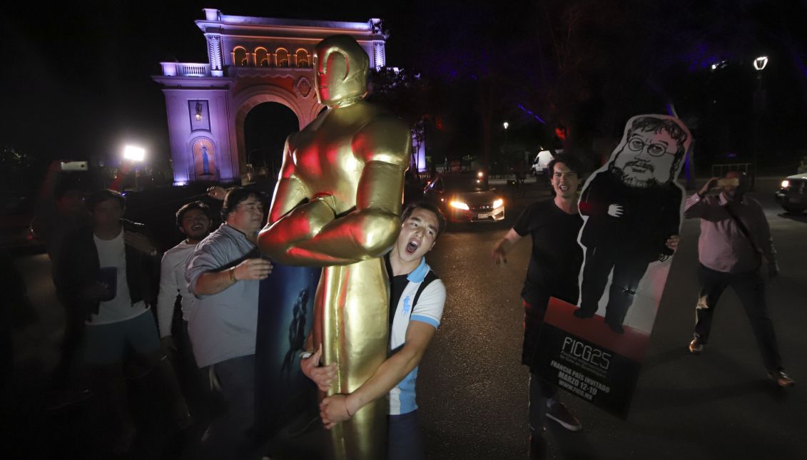 People celebrate Guillermo del Toro's triumph at the Oscars, in Guadalajara, Mexico, Mar. 5, 2018. EPA-EFE/Carlos Zepeda
