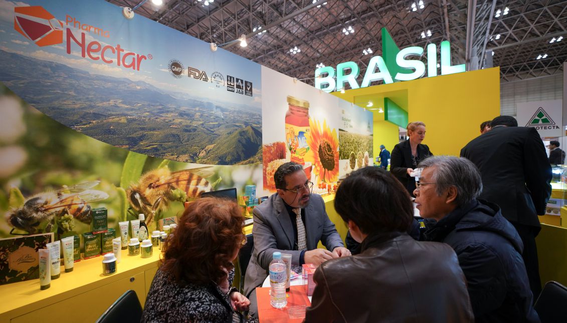 Visitors have a meeting with a exhibitor showcasing health supplements at the Brazilian pavilion during the 43rd International Food and Beverage Exhibition (FOODEX JAPAN 2017) at Makuhari Messe Convention Center in Chiba, east of Tokyo, Japan, Mar. 6, 2018. EPA-EFE/CHRISTOPHER JUE
