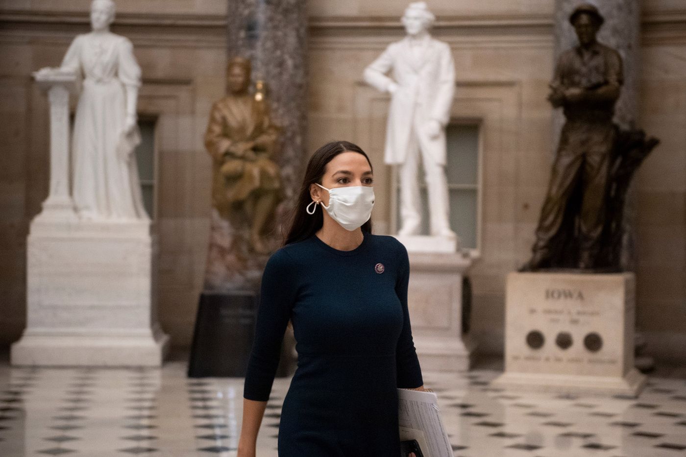 AOC plus 35 lawmakers are urging the Biden administration to“End the carceral approach to immigration.” Photo:  BRENDAN SMIALOWSKI | Credit: AFP via Getty Images