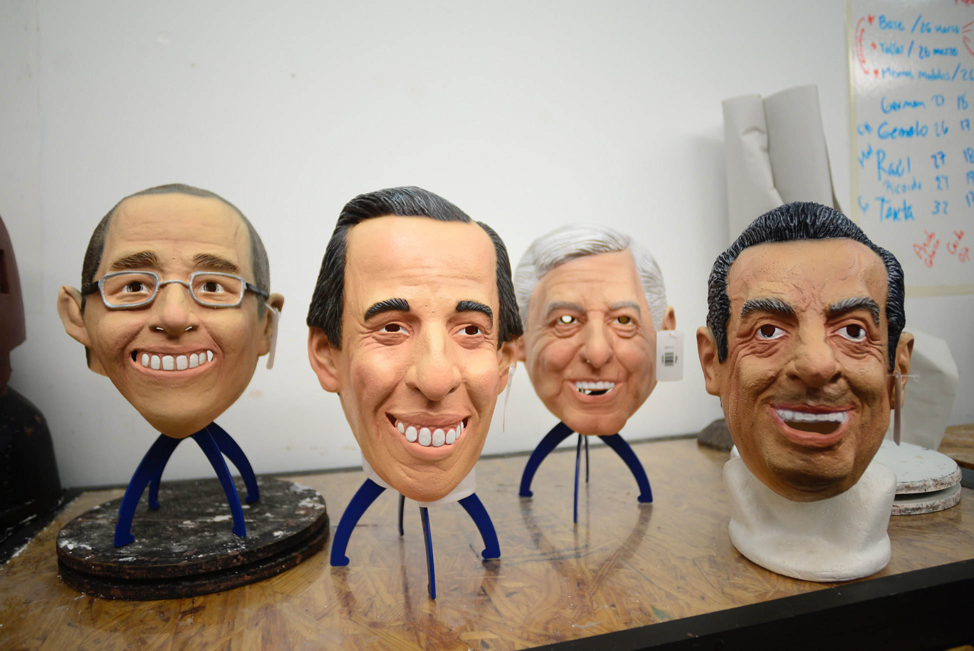 Photo provided on April 4, 2018, showing masks made with latex and painted by hand imitating the faces of the Mexican presidential candidates at Grupo REV headquarters in Cuernavaca, Mexico, April 1, 2018. EPA-EFE/Tony Rivera
