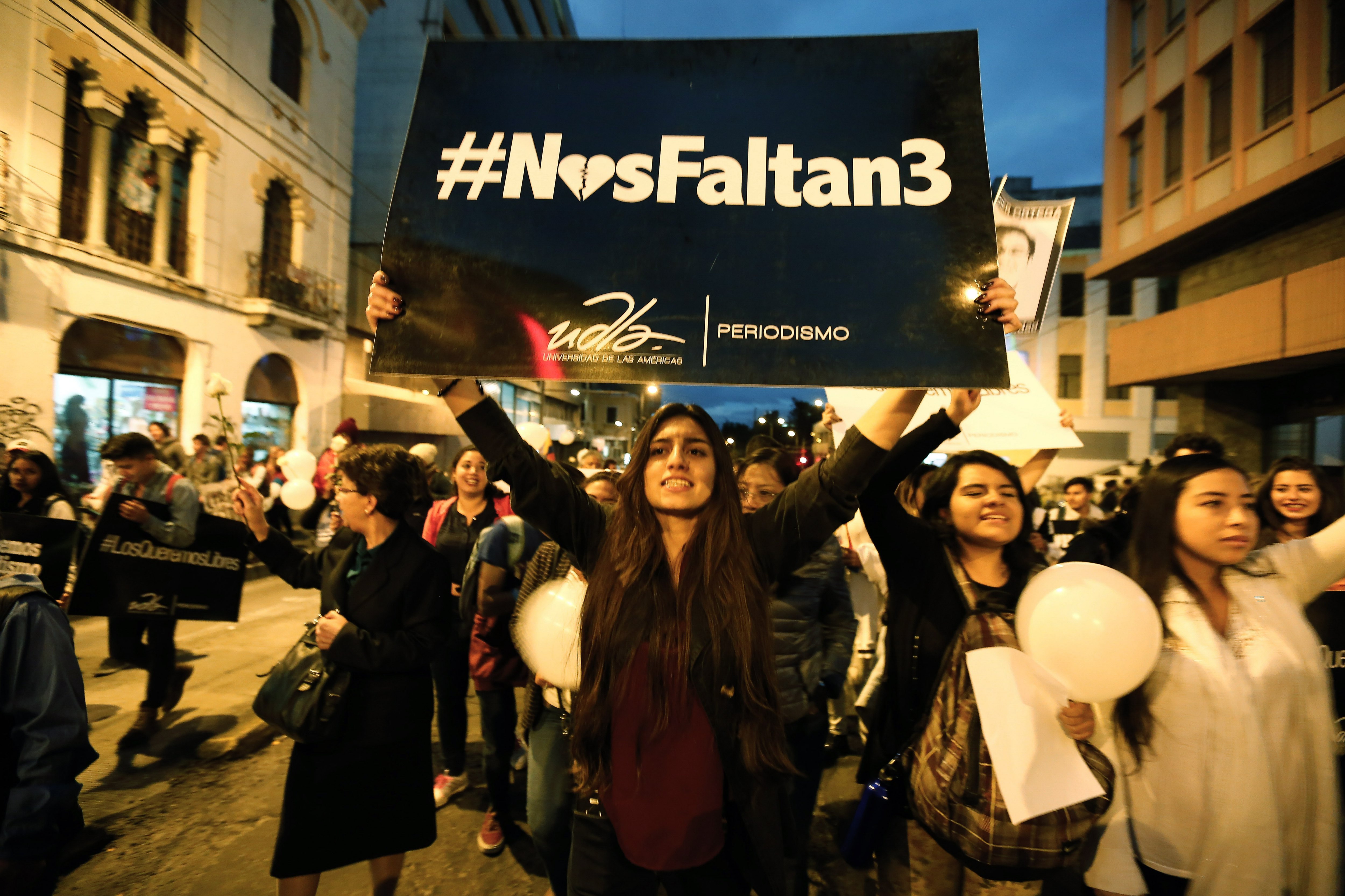 Friends and colleagues of the journalist team kidnapped and later killed on the Colombian border participate in a march through the streets of Quito, Ecuador, 19 April 2018. The three-person team was kidnapped on 26 March 2018 by Colombian insurgents. Banner reads: We are missing 3. EPA-EFE/JOSE JACOME