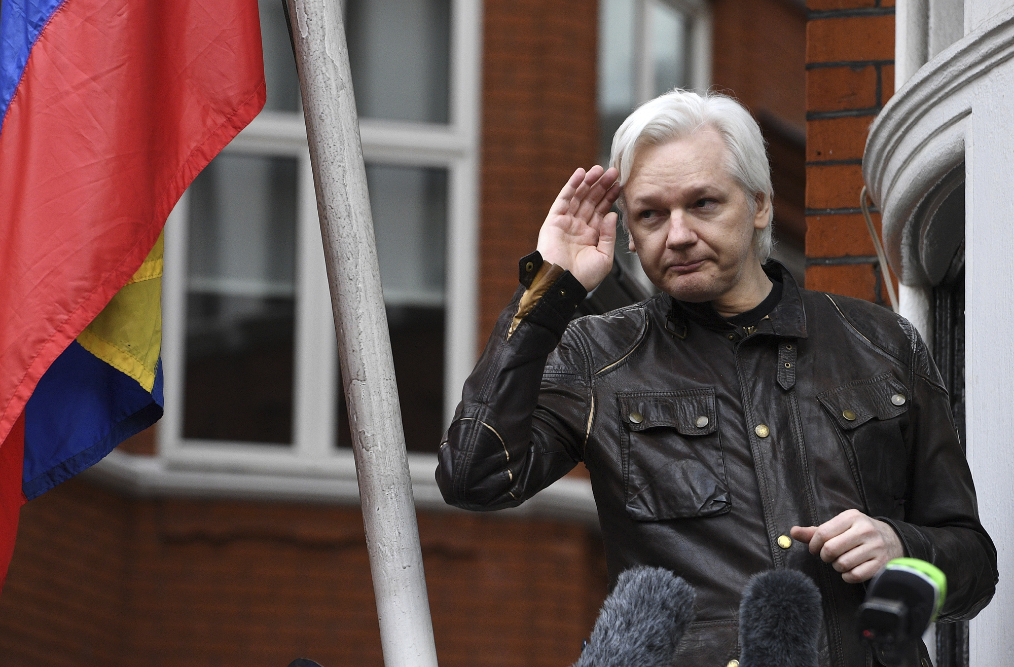 WikiLeaks founder Julian Assange speaks to reporters on the balcony of the Ecuadorian embassy in London, Britain, May 19, 2017. EPA-EFE FILE/FACUNDO ARRIZABALAGA
