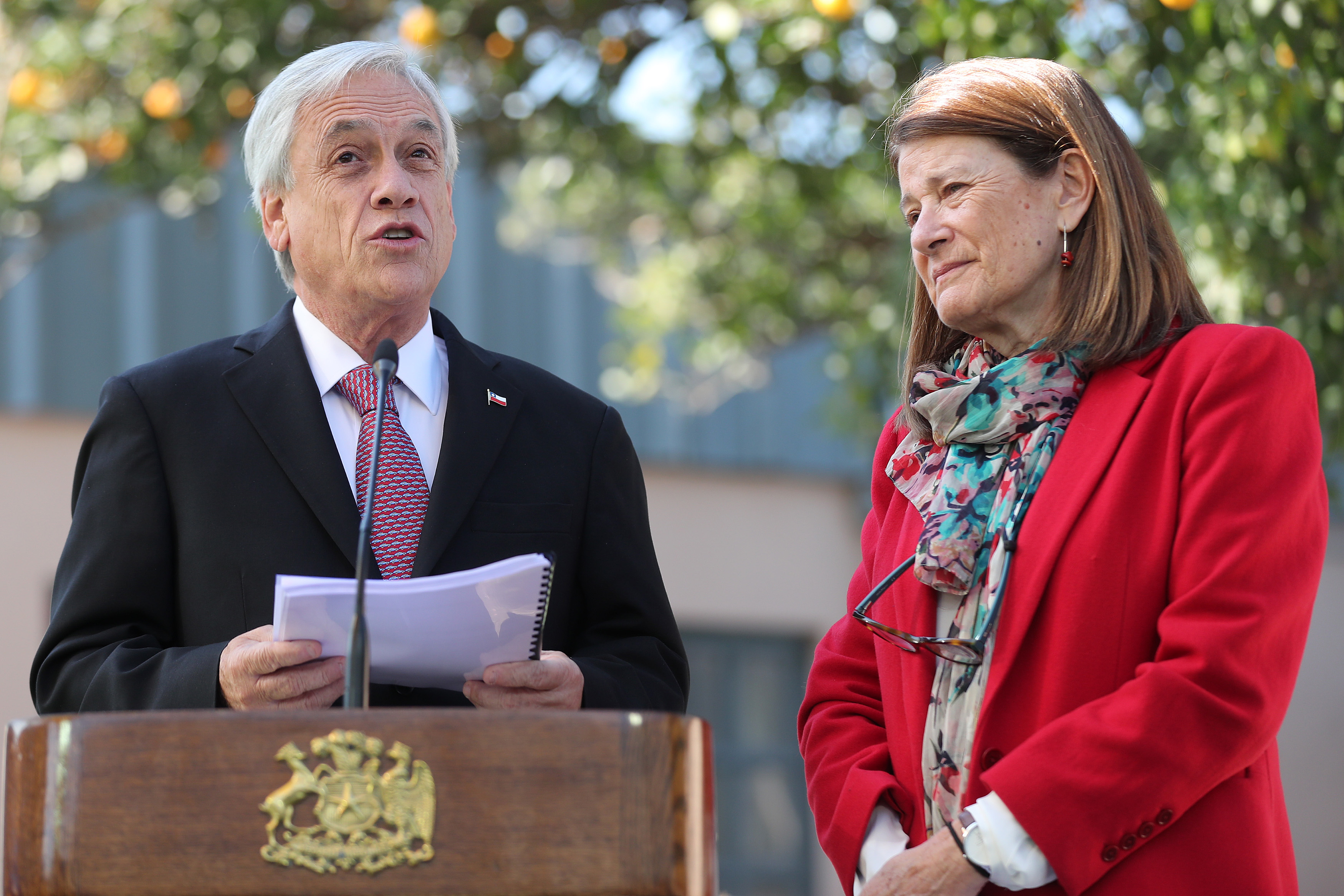 Chilean president Sebastian Piñera (L) and the head National System for Minors (Sename) Susana Tonda (R) speak during a visit to the Galvarino shelter, in Santiago, Chile, May 24, 2018. EPA-EFE/Mario Ruiz