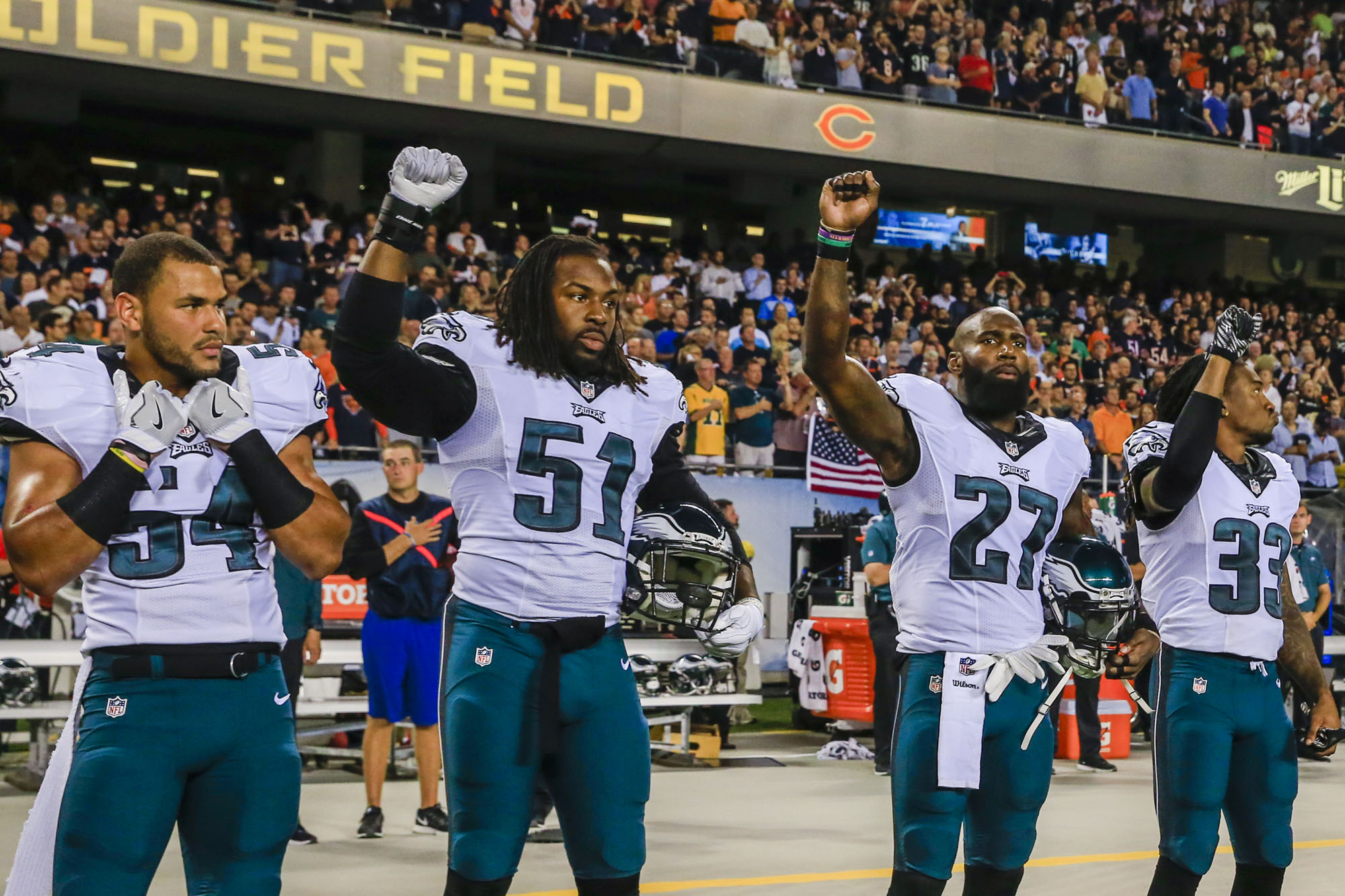 Philadelphia Eagles defensive player Steven Means (2-L), Philadelphia Eagles defensive player Malcolm Jenkins (3-L) and Philadelphia Eagles defensive player Ron Brooks (4-L) stand with their fists in the air during the singing of the US National Anthem before the start of the NFL American Football game between the Philadelphia Eagles and the Chicago Bears at Soldier Field in Chicago, Illinois, USA, 19 September 2016. EPA-EFE/FILE/TANNEN MAURY