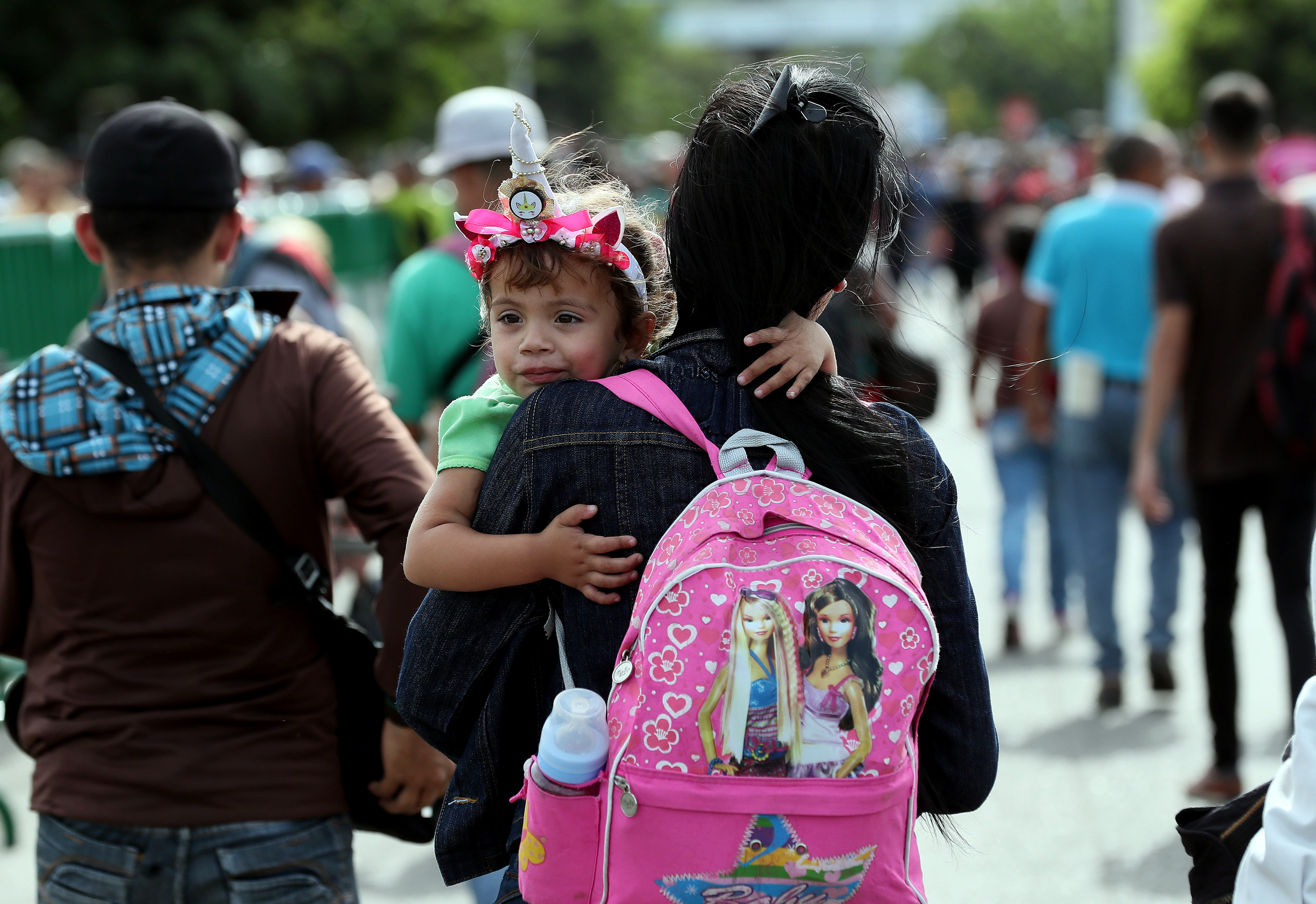 Venezuelan migrants cross the Simon Bolivar International Bridge into Colombia on June 1, 2018, in Cucuta, Colombia. EPA-EFE FILE/MAURICIO DUEÑAS CASTAÑEDA