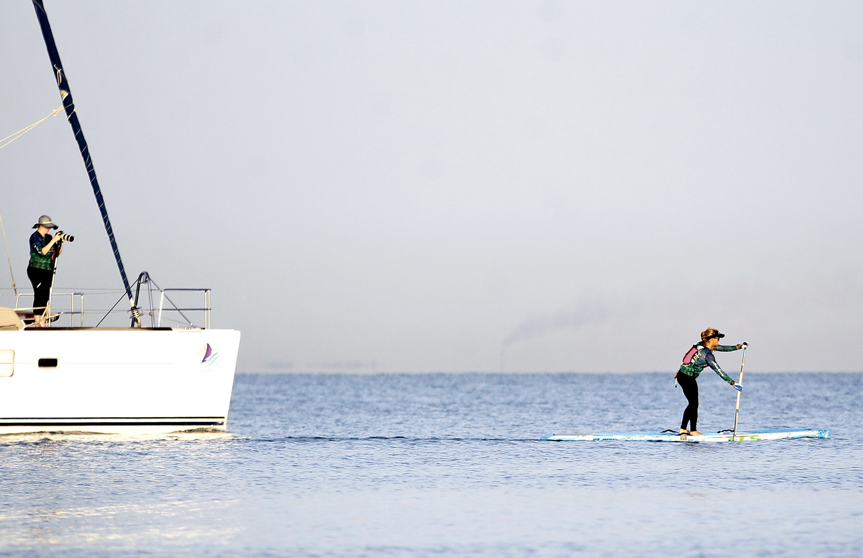 Photograph showing U.S. citizen Victoria Burgess as she sets off on her journey across the Florida Strait on a stand-up paddleboard in Havana, Cuba, Jun 26, 2018. EPA-EFE/Yander Zamora
