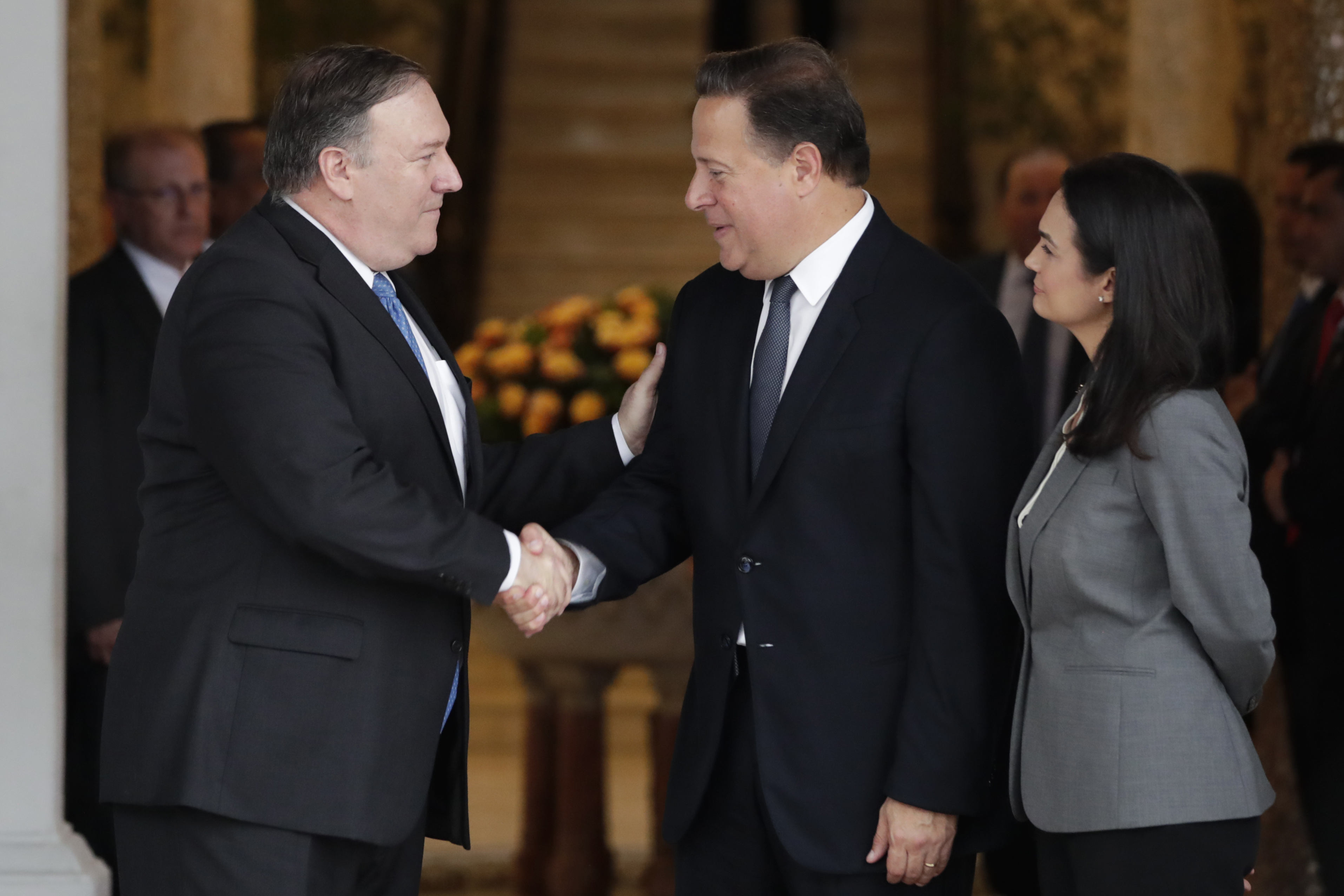 U.S. Secretary of State Mike Pompeo (L) and Panamanian President Juan Carlos Varela (R) shake hands next to Panamanian Vice President and Foreign Minister Isabel de Saint Malo, at Las Garzas Presidential Palace, in Panama City, Panama, October 18, 2018. EPA-EFE/Bienvenido Velasco
