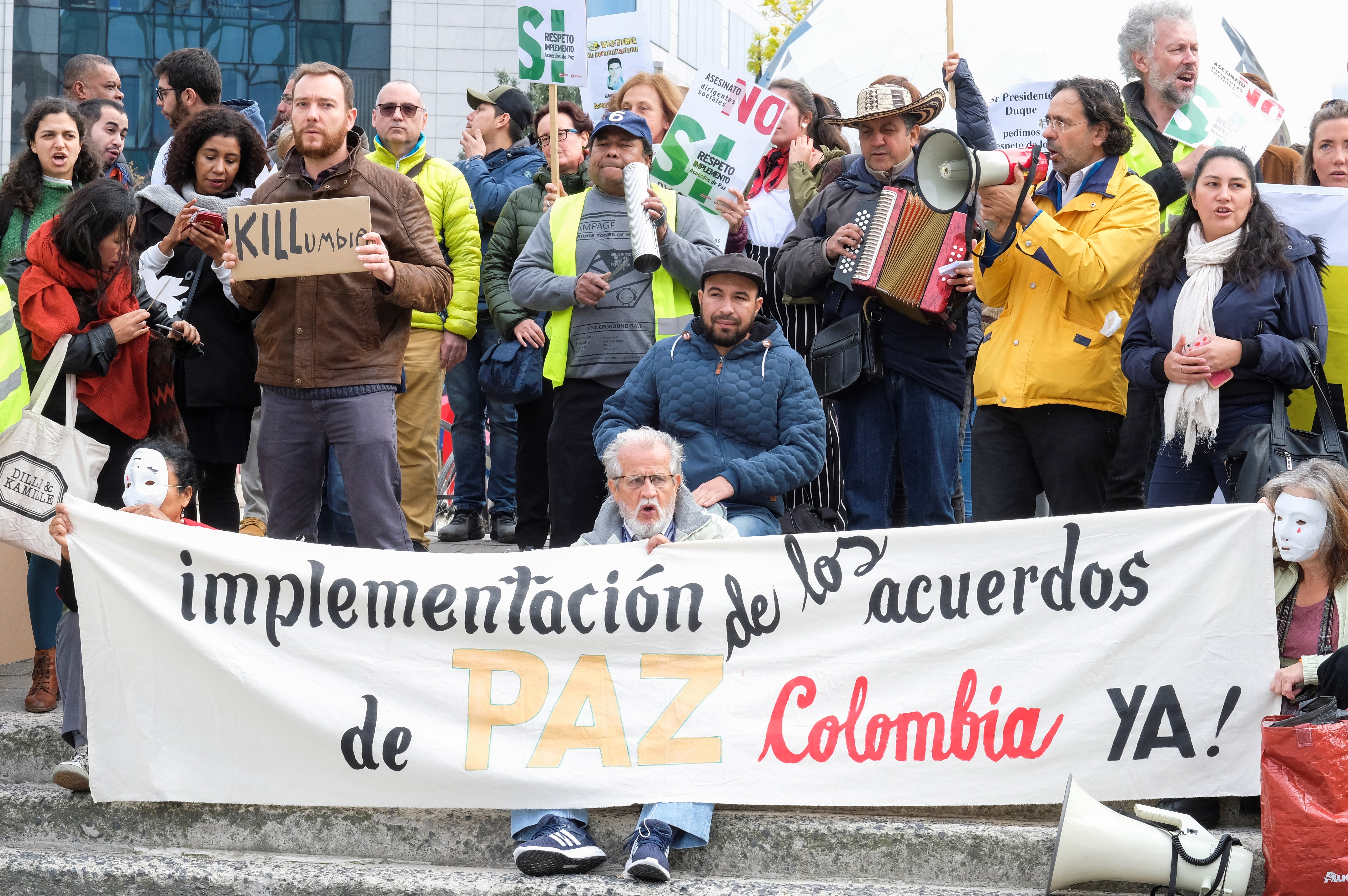 Colombians in exile protest against visit of Colombian President Ivan Duque Marquez to the European institution in Brussels, Belgium, Oct. 24, 2018. EPA-EFE/OLIVIER HOSLET
