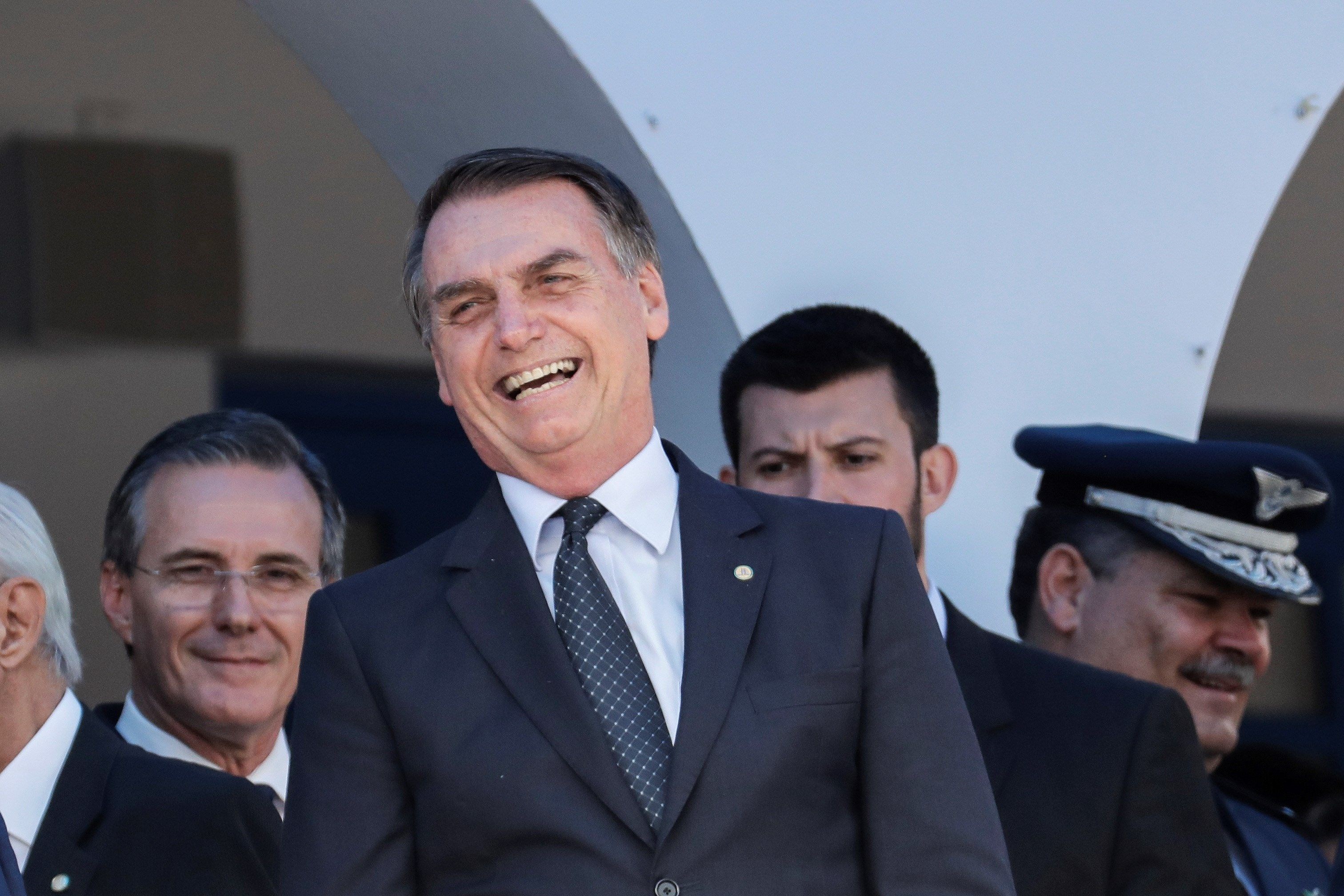 Brazilian President-elect Jair Bolsonaro (c.) attends an officers' graduation ceremony in Sao Paulo state on Nov.30, 2018, after which he called for prudent consideration before his country signs any trade agreements with other nations. EFE-EPA/ Sebastiao Moreira
