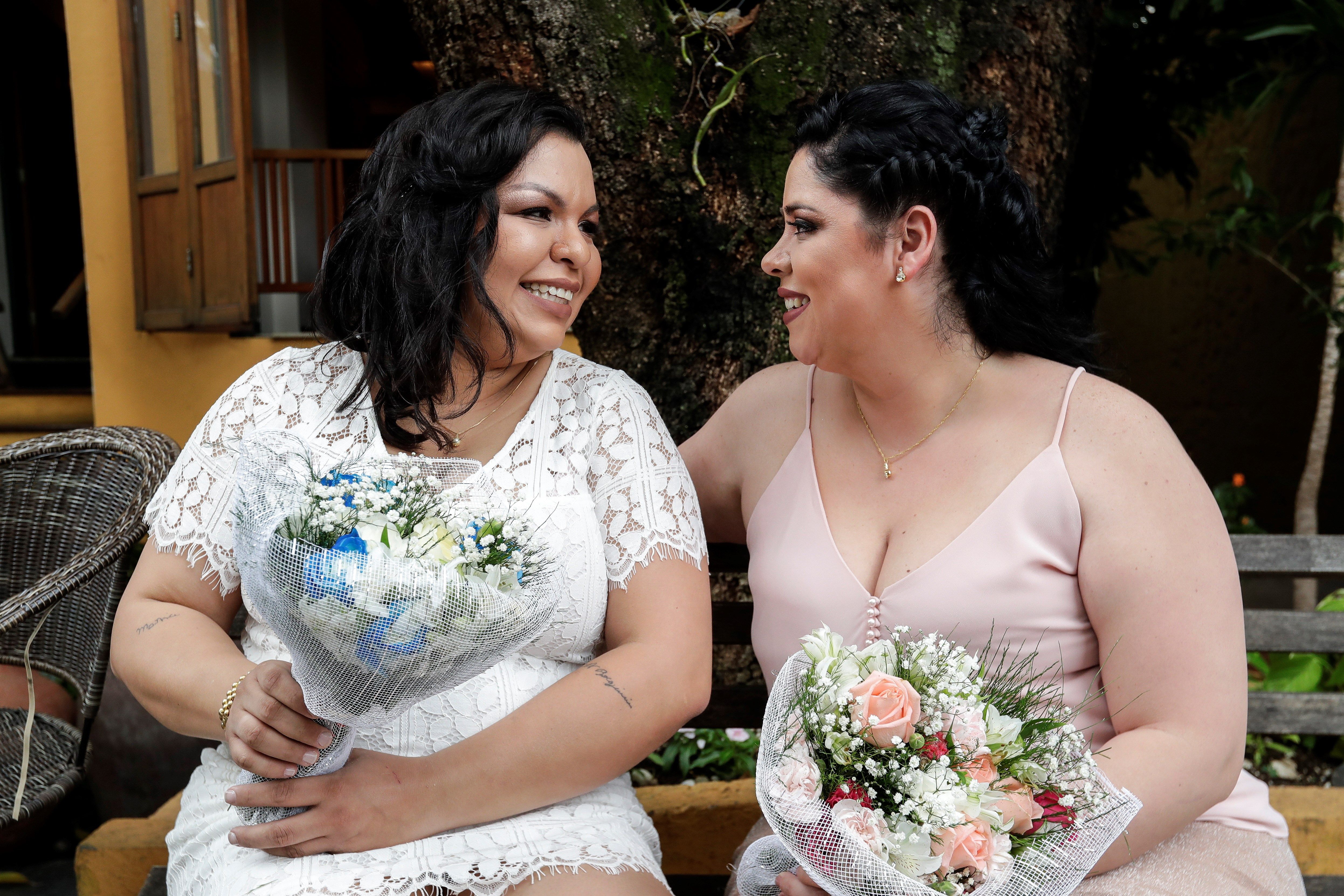 Gay businesswomen Michele Nobre (l.) and Stephanye dos Santos (r.) get married on Nov. 24, 2018, instead of waiting longer as they had planned, out of fear of a reduction of LGBT rights in Brazil following the inauguration of President-elect Jair Bolsonaro. EFE-EPA/Sebastiao Moreira